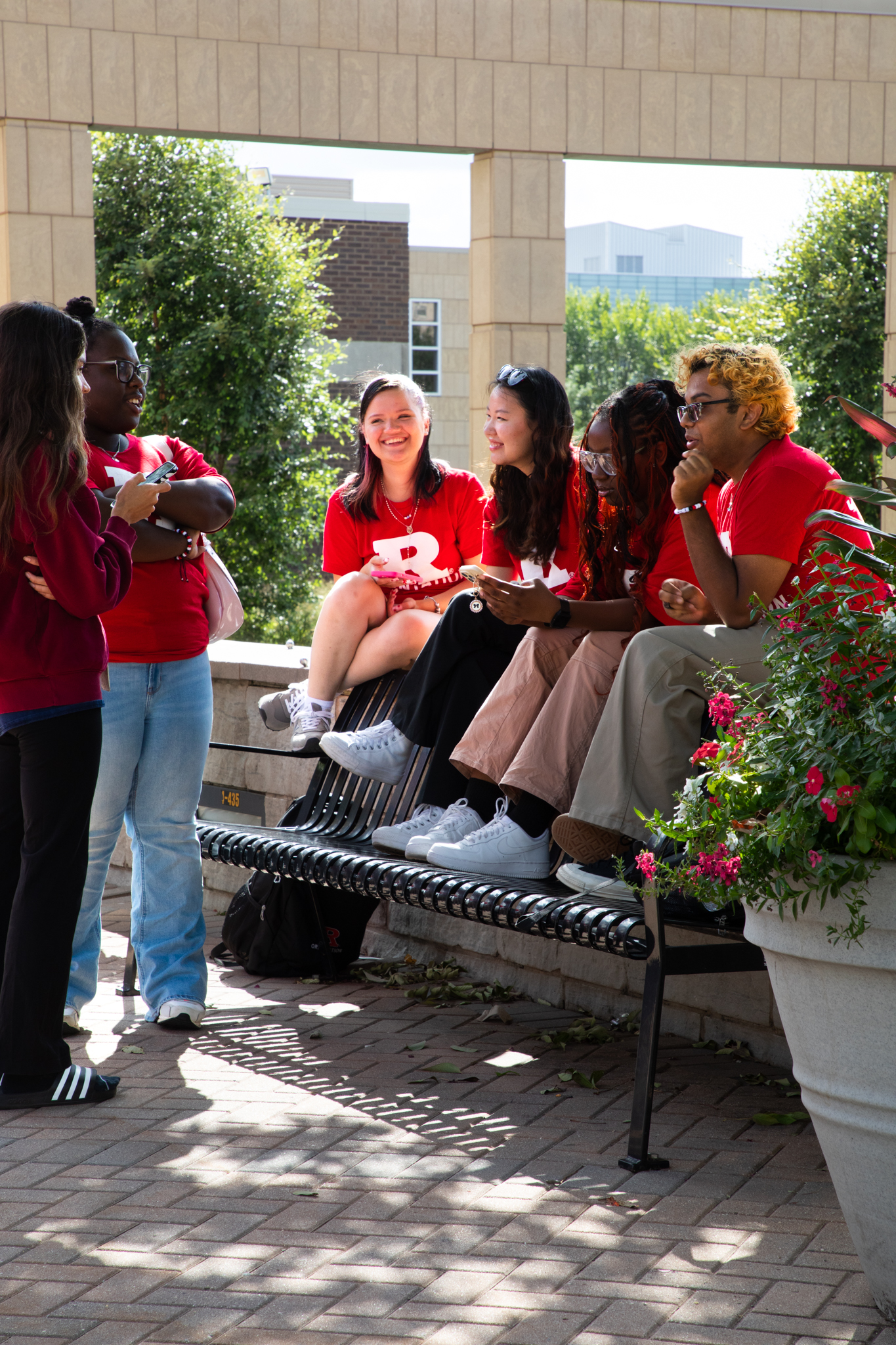 Group of students talking in a circle